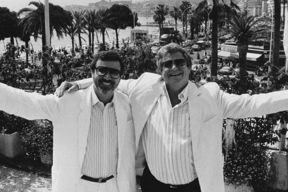 Israel film producers and directors Yoram Globus (left) and Menahem Golan, owners of Cannon Films, at the Cannes Film Festival, France, circa 1987. (Photo by Richard Blanshard/Getty Images)