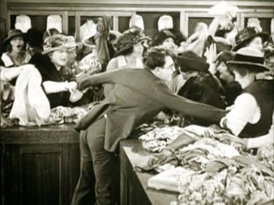 Harold Lloyd in Safety Last department store gag 