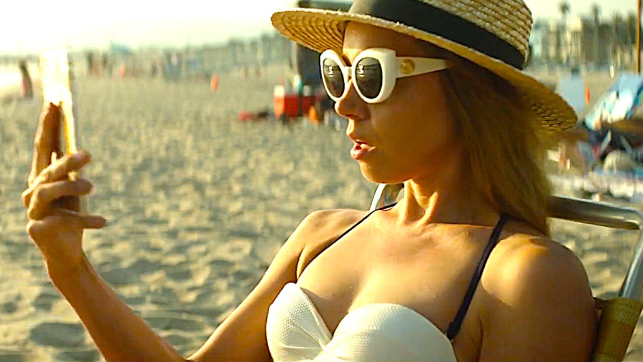 Aubrey Plaza checks her phone in Ingrid Goes West