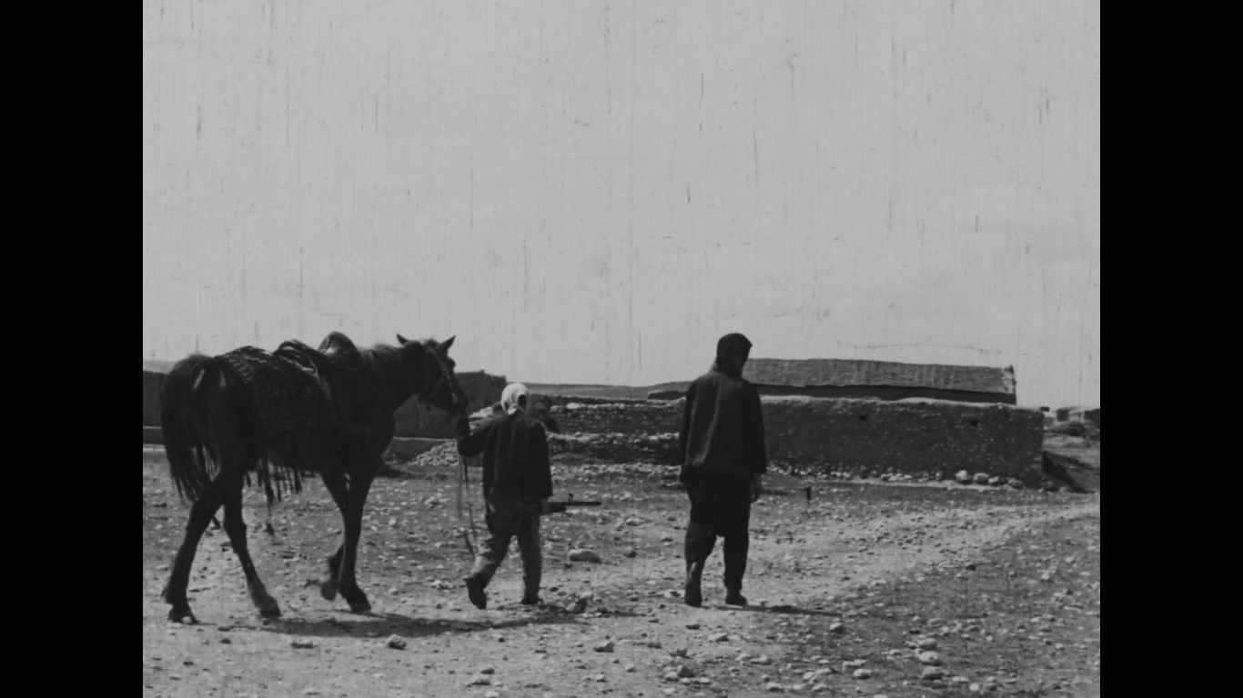 Yilmaz Güney and child in Lütfi Akad's Law of the Border